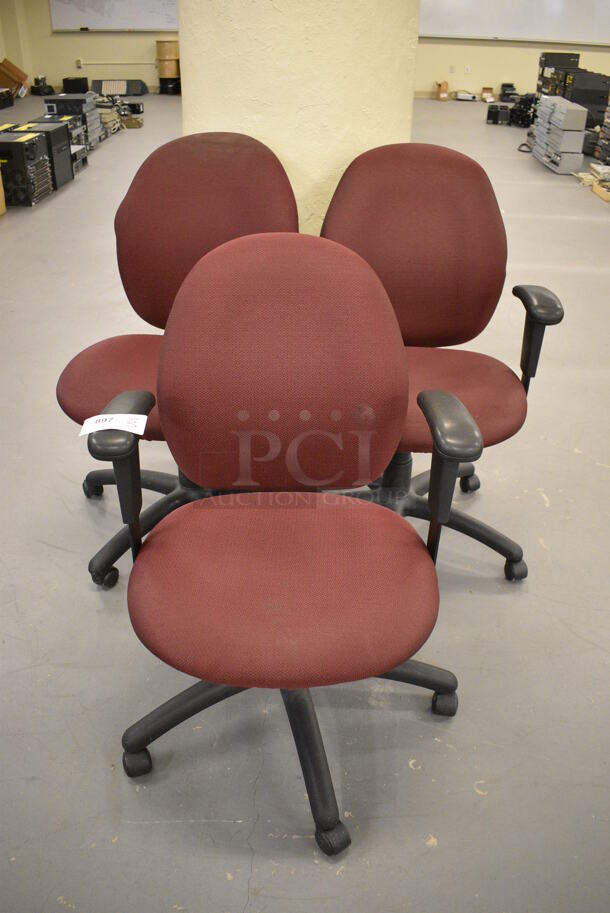 3 Maroon Office Chairs w/ Arm Rests on Casters. 25x22x37. 3 Times Your Bid! (south basement 019) - Image 1 of 4