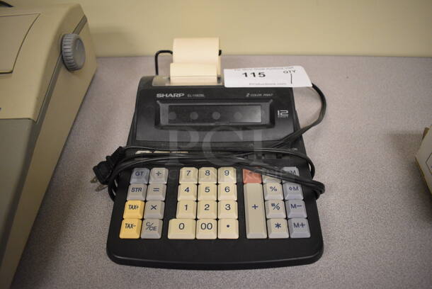 Sharp EL-1192BL Countertop Printing Calculator. 8x11x2.5. (room 105)