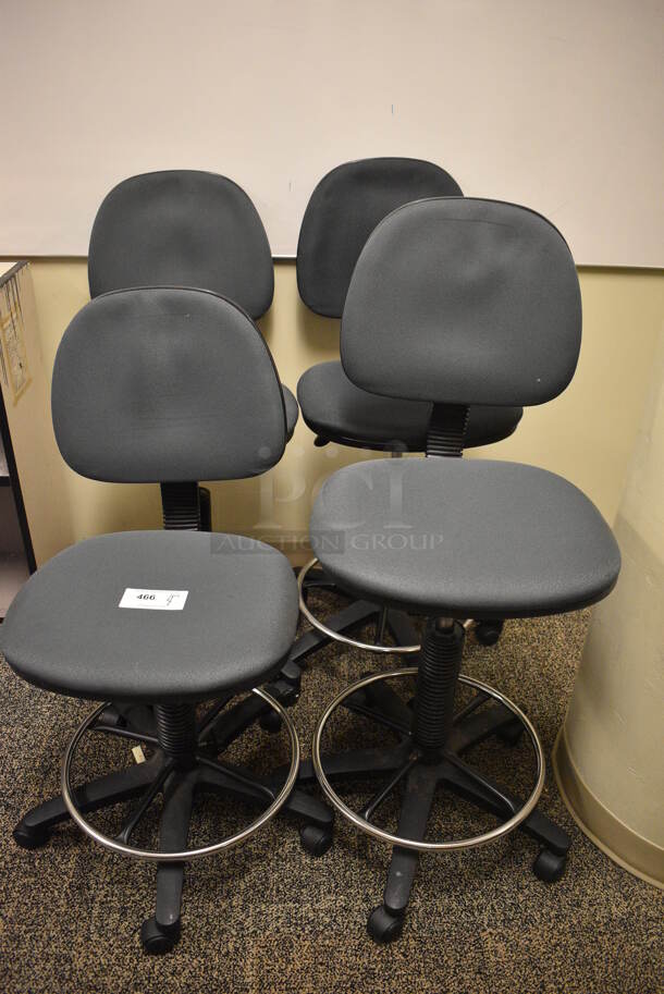 4 Gray Office Chairs on Casters. Includes 20x20x43. 4 Times Your Bid! (room 211)
