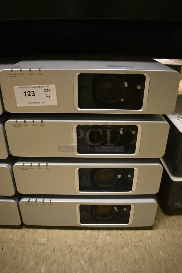 4 Panasonic PT-FW300NT Projectors. 17x13x5. 4 Times Your Bid! (room 105)