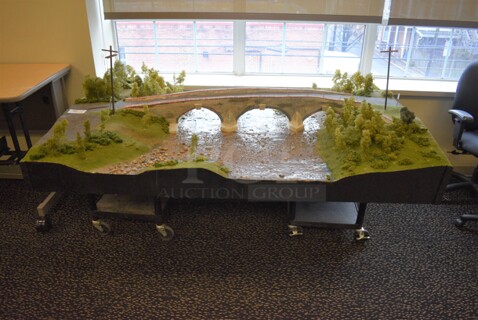 Diorama of Bridge Going Across River w/ 2 Carts. 79x49x10, 24x18x25. (room 220)