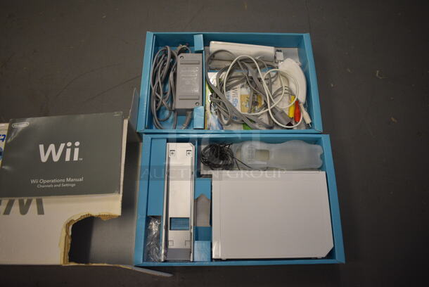 ALL ONE MONEY! Lot of Nintendo Wii w/ Controller and Joystick Controller. 8.5x2x6.5. (south basement 019)