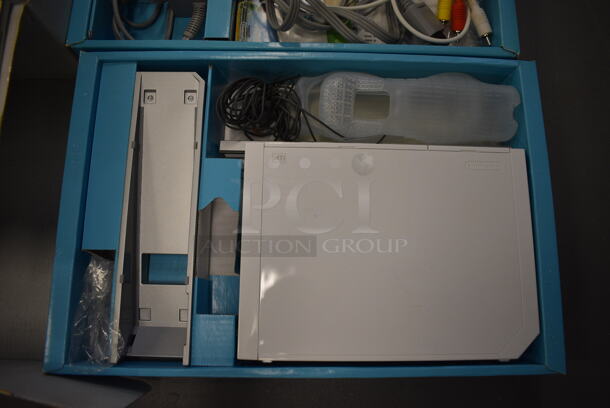 ALL ONE MONEY! Lot of Nintendo Wii w/ Controller and Joystick Controller. 8.5x2x6.5. (south basement 019) - Image 2 of 3