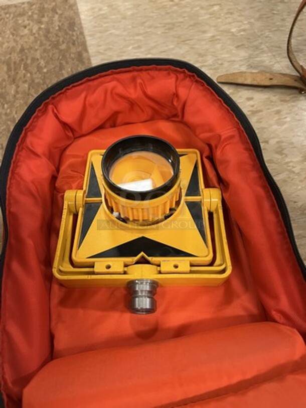 Yellow Surveying Piece in Red Soft Bag. 6.5x7x3. (room 122) - Image 1 of 3