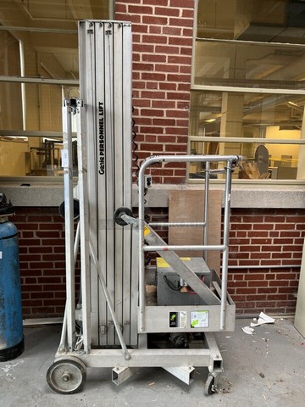 Genie Model PLC-30DC Metal Personnel Lift. 300 Pound Capacity. Unit Needs a New Chain. 28x48x91. (loading dock) - Image 2 of 12