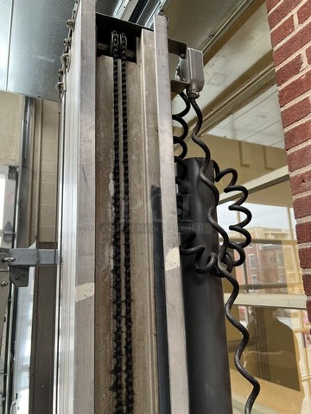 Genie Model PLC-30DC Metal Personnel Lift. 300 Pound Capacity. Unit Needs a New Chain. 28x48x91. (loading dock) - Image 7 of 12