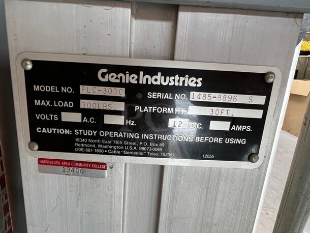 Genie Model PLC-30DC Metal Personnel Lift. 300 Pound Capacity. Unit Needs a New Chain. 28x48x91. (loading dock) - Image 11 of 12