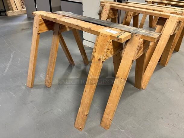 2 Wooden Saw Horses. 48x31x33. 2 Times Your Bid! (room 130)