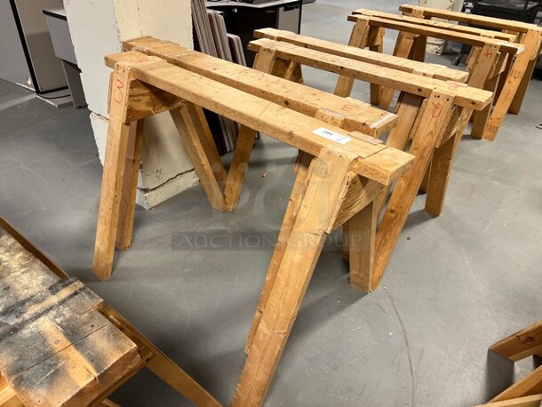 4 Wooden Saw Horses. 48x32x34, 46x31x32. 4 Times Your Bid! (room 130)