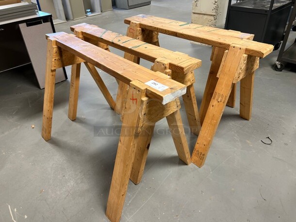 4 Wooden Saw Horses. Includes 48x26x29. 4 Times Your Bid! (room 130)