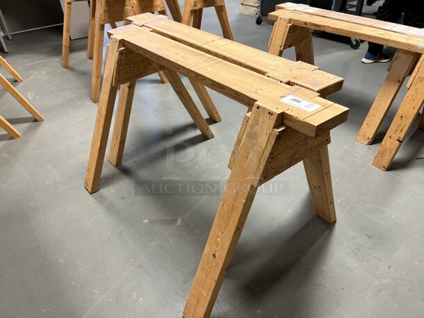 2 Wooden Saw Horses. Includes 48x32x28.5. 2 Times Your Bid! (room 130)