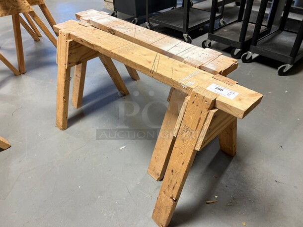 2 Wooden Saw Horses. 48x24x23, 46x24x23. 2 Times Your Bid! (room 130)