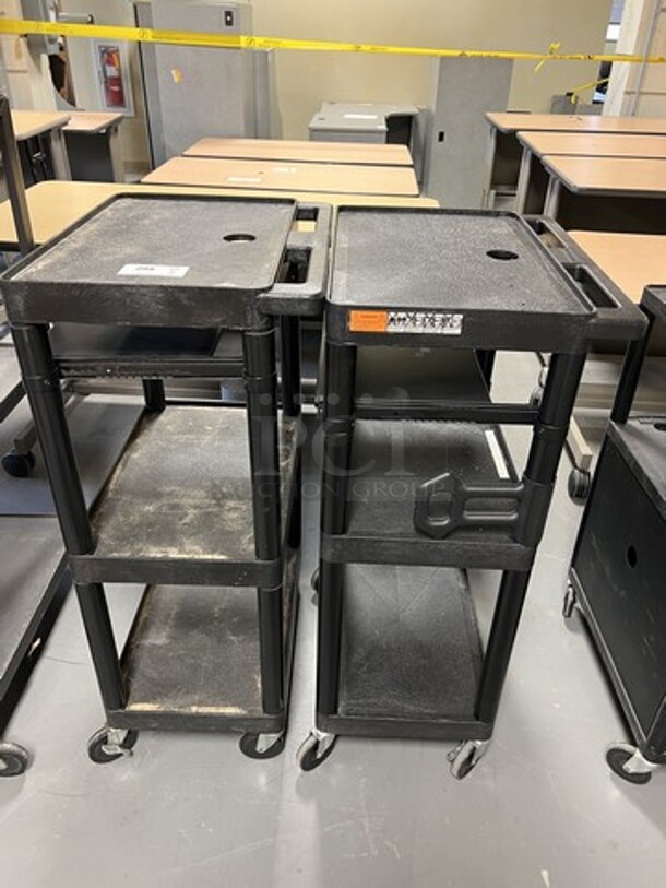 2 Black Poly 2 Tier AV Cart on Commercial Casters. 19x24x44.5. 2 Times Your Bid! (room 130)
