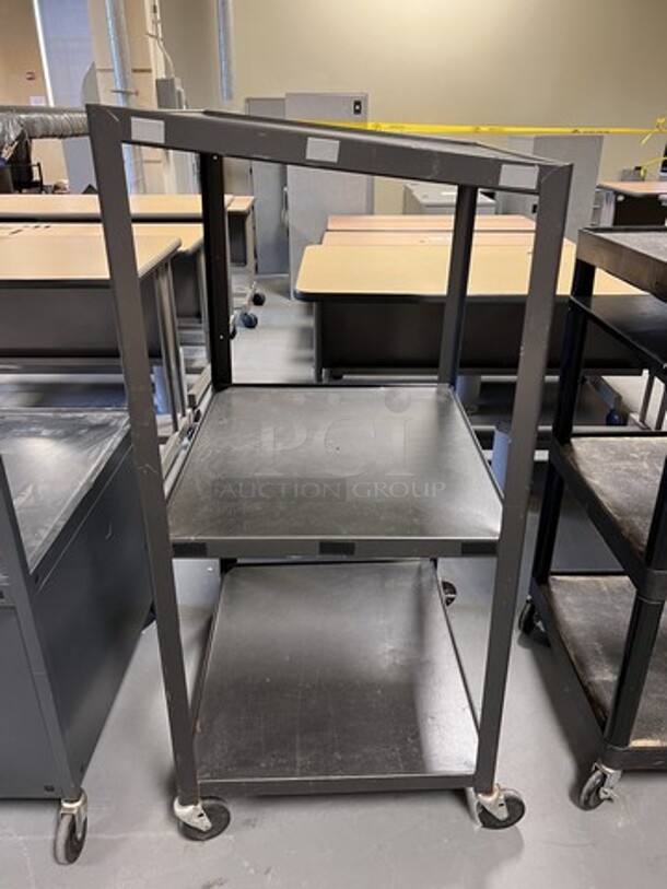 2 Black Metal 2 Tier AV Cart on Commercial Casters. 25x29x54, 22x30x54. 2 Times Your Bid! (room 130) - Image 2 of 3