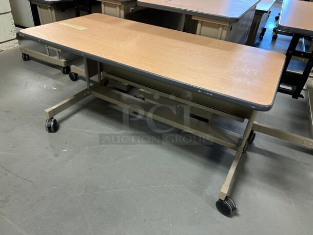 6 Wood Pattern Tables on Metal Frame w/ Casters. 60x30x31. 6 Times Your Bid! (room 130) - Image 2 of 4