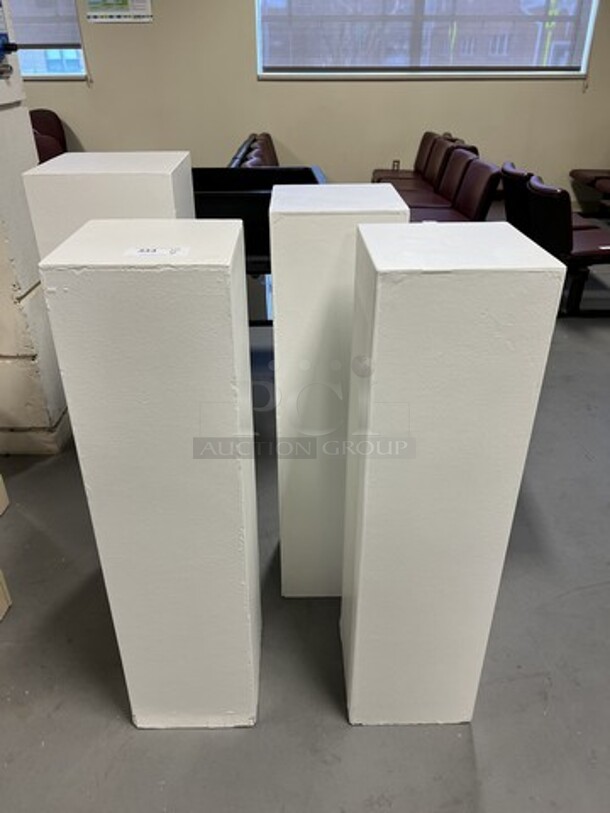 4 White Columns. 11.5x11.5x45.5, 11.5x11.5x48. 4 Times Your Bid! (room 130)