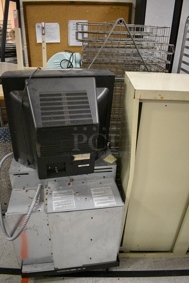 ALL ONE MONEY! Lot of Various Items Including Desks, Filing Cabinets, Stainless Steel Sink. Does Not Include Metal Pan Transport Rack, Metal Baskets, Ramp and One Tan File Drawer Cabinet. BUYER MUST REMOVE. Includes 60x28x29. (Clearview Elementary - Gym) - Image 7 of 12
