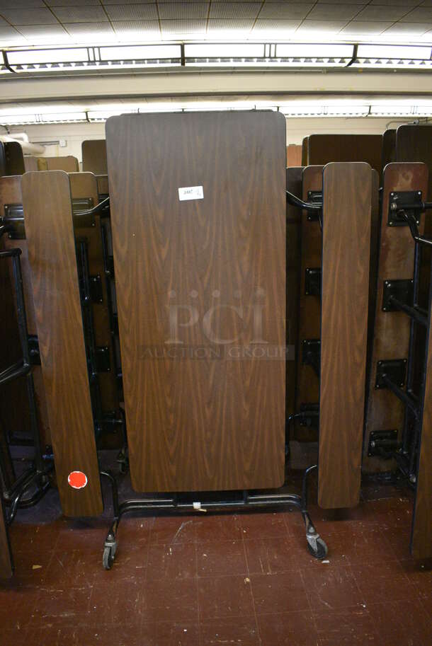 7 Various Folding Cafeteria Tables. BUYER MUST REMOVE. Includes 140x17x57. 7 Times Your Bid! (Clearview Elementary - Lower Level Room 13)