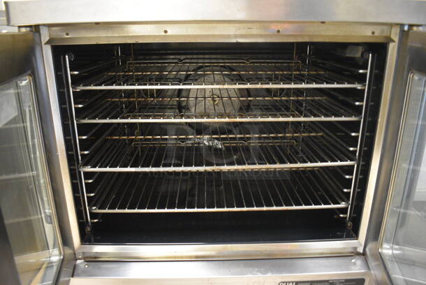Blodgett Stainless Steel Commercial Full Size Convection Oven w/ View Through Doors, Metal Oven Racks and Thermostatic Controls on Commercial Casters. Goes GREAT w/ Lot 8! BUYER MUST REMOVE. 38.5x41x38. (Clearview Elementary - Upstairs Hallway) - Image 5 of 7