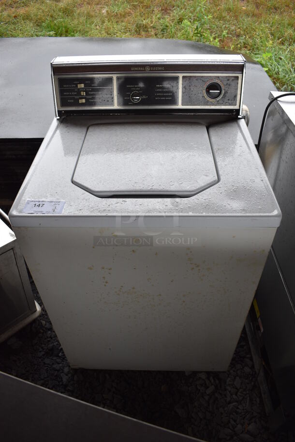 General Electric Metal Top Load Washer. BUYER MUST REMOVE. 27x25x44. (stadium) - Image 1 of 10