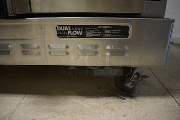 Blodgett Stainless Steel Commercial Full Size Convection Oven w/ View Through Doors, Metal Oven Racks and Thermostatic Controls on Commercial Casters. Goes GREAT w/ Lot 8! BUYER MUST REMOVE. 38.5x41x38. (Clearview Elementary - Upstairs Hallway) - Image 7 of 7