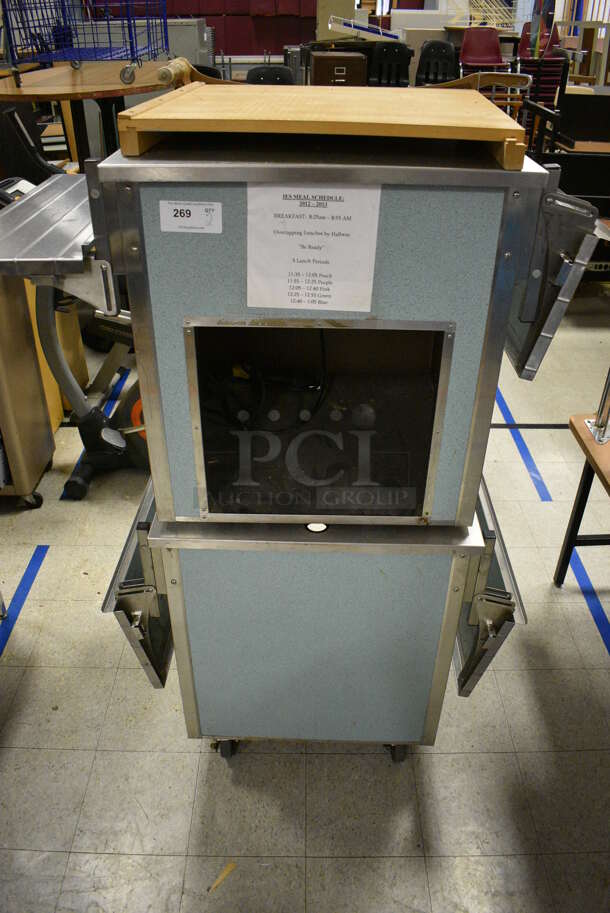 2 Vollrath Model M37015-2494-NNA Metal Commercial Serving Counters w/ Tray Slides. 1 on Commercial Casters. 53.5x26.5x29. 2 Times Your Bid! (Clearview Elementary - Gym)