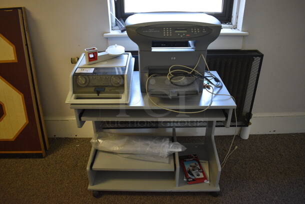 ALL ONE MONEY! Lot of Gray Table on Casters, and HP LaserJet 3300 Printer Copier Scanner. Does Not Come w/ Audiometer Shown In Pictures. BUYER MUST REMOVE. 36x20x29.5. (Clearview Elementary - Upstairs Hallway) - Image 1 of 6