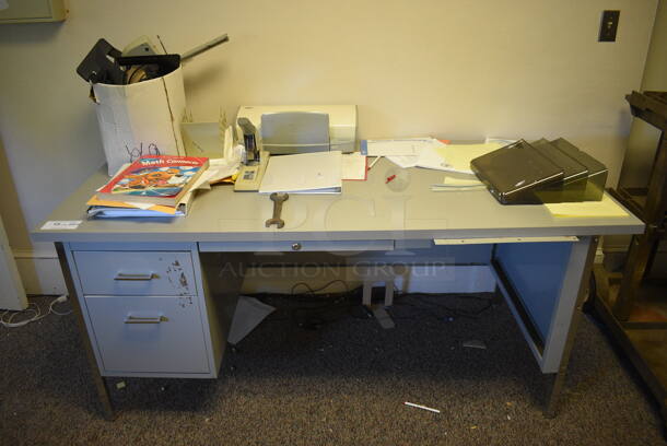 ALL ONE MONEY! Lot of Gray Metal Table w/ Contents Including Wrench, Printer and Stapler. BUYER MUST REMOVE. 66x31x29.5. (Clearview Elementary - Upstairs Hallway)