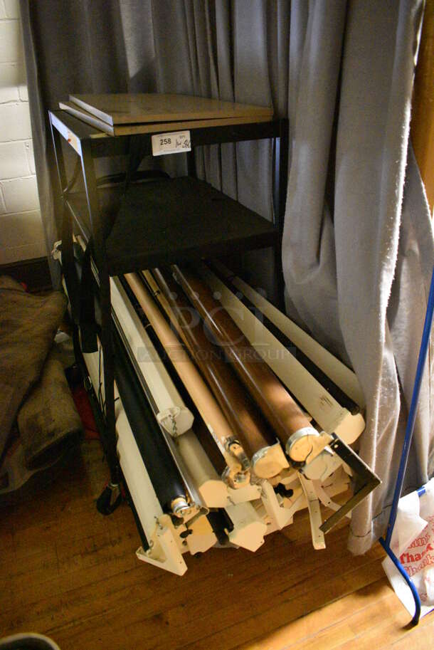 ALL ONE MONEY! Lot of Black Metal AV Cart w/ 34 Projector Screens / Maps. BUYER MUST REMOVE. Includes 32.5x22x48. (Clearview Elementary - Stage) - Image 1 of 4