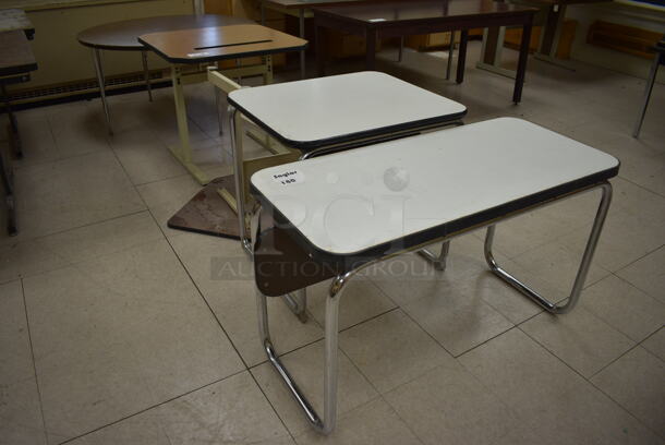 5 Various Tables/Desks. BUYER MUST REMOVE. Includes 42x19x26. 5 Times Your Bid! (Clearview Elementary - Room 11)