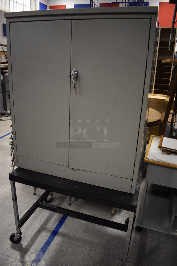 ALL ONE MONEY! Lot of Various Items Including Chairs, Tables, Cart, Cabinet and Desks. Does Not Include The Warmer and a Few Other Items Wrapped In Caution Tape. BUYER MUST REMOVE. Includes 36x18.5x42. (Clearview Elementary - Gym) - Image 4 of 8