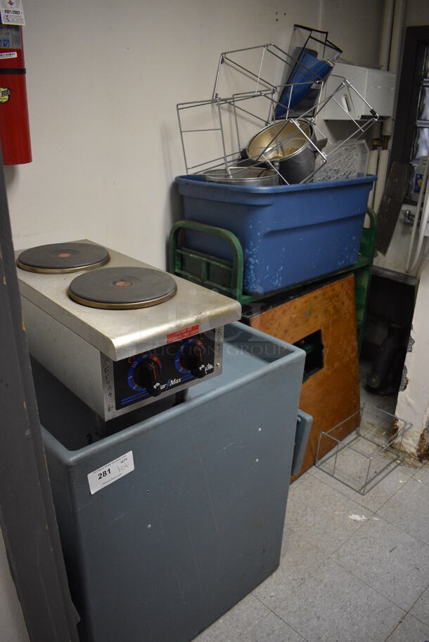 ALL ONE MONEY! Lot of Various Items Including Star Max 2 Burner Range, Metal Bins, Metal Racks, Blue Poly Cart and Green Metal Cart. BUYER MUST REMOVE. Includes 12x26x12. (Clearview Elementary - Kitchen)