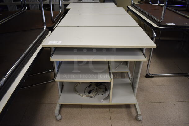 16 Light Gray Desks on Casters. BUYER MUST REMOVE. 35.5x20x31.5. 16 Times Your Bid! (Clearview Elementary - Room 12) - Image 1 of 5