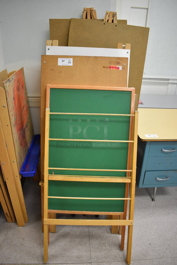 10 Various Easels. BUYER MUST REMOVE. Includes 24x2.5x54. 10 Times Your Bid! (Clearview Elementary - Room 10)