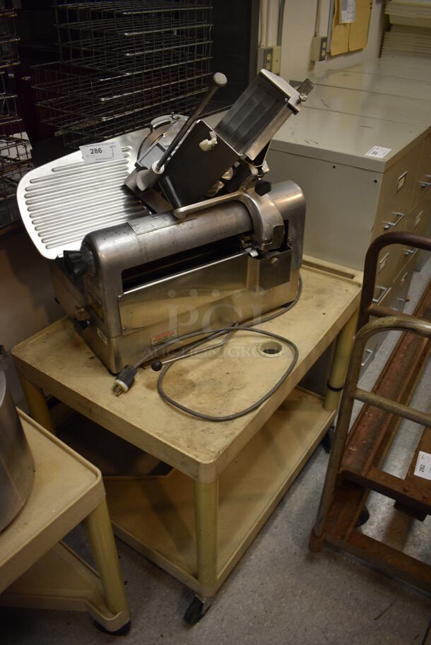 Hobart Model 1712 Stainless Steel Commercial Countertop Automatic Meat Slicer and Tan Poly Cart. 115 Volts, 1 Phase. Includes 24x16x26. (Clearview Elementary - Kitchen)