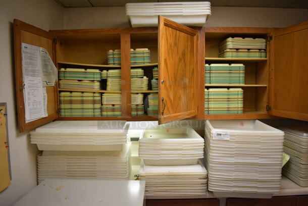 ALL ONE MONEY! Lot of Poly Trays in Cabinets and White Poly Bins and Lids on Countertop. BUYER MUST REMOVE. Includes 18x25x3. (Clearview Elementary - Kitchen) - Image 1 of 6