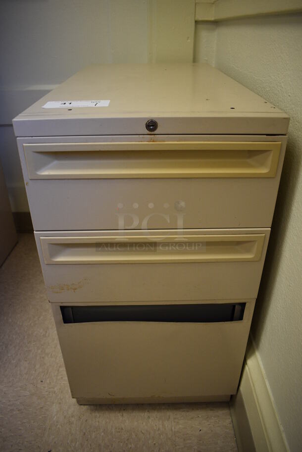 Tan Metal 3 Drawer Filing Cabinet. BUYER MUST REMOVE. 15x29x28. (Clearview Elementary - Room 10)