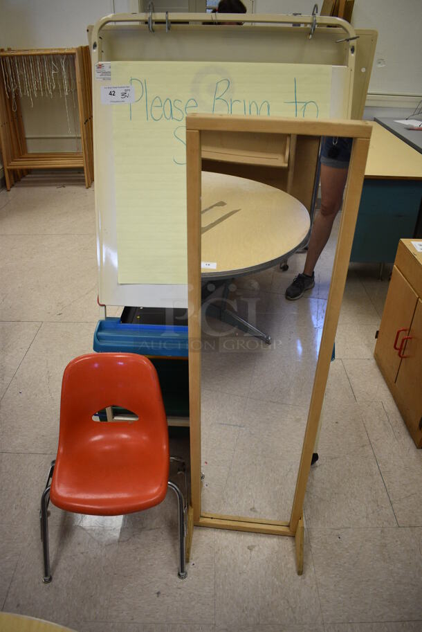 3 Various Items; Easel, Mirror and Chair. BUYER MUST REMOVE. Includes 30x30x57. 3 Times Your Bid! (Clearview Elementary - Room 10)