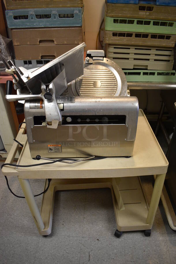 Hobart Model 1712E Stainless Steel Commercial Countertop Automatic Meat Slicer w/ Blade Sharpener and Tan Poly Cart. 115 Volts, 1 Phase. Includes 35x24x27.5. (Clearview Elementary - Kitchen) - Image 1 of 9