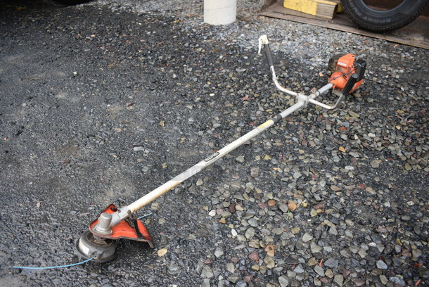 Echo Model SRM-300AE String Trimmer Weed Whacker. BUYER MUST REMOVE. 22.5x69x16. (stadium) - Image 1 of 11