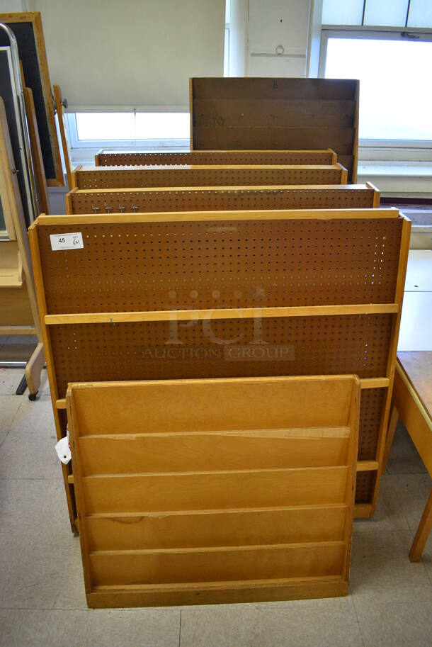6 Various Magazine Racks. BUYER MUST REMOVE. Includes 48x14x48. 6 Times Your Bid! (Clearview Elementary - Room 10)