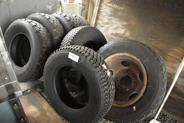 ALL ONE MONEY! Lot of 8 Various Tires Including Goodyear G633 RSD and Wrangler AT. BUYER MUST REMOVE. Includes 28x8x28. (stadium)
