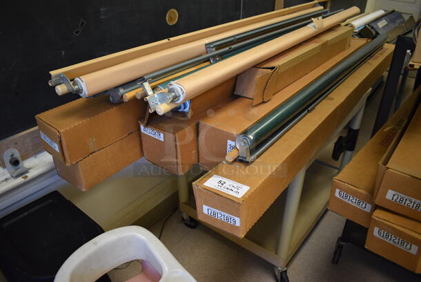 ALL ONE MONEY! Lot of Tan Poly Cart w/ Contents Including 14 Items; Pull Down Maps and Projectors. BUYER MUST REMOVE. Includes 69". (Clearview Elementary - Room 10) - Image 1 of 7