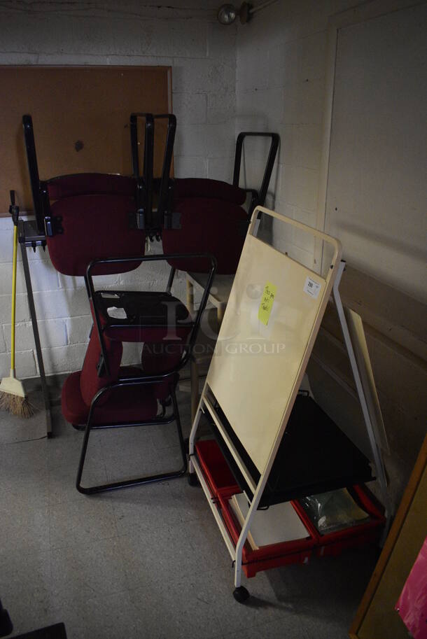 ALL ONE MONEY! Lot of Easel on Casters, Shelf and 4 Chairs. BUYER MUST REMOVE. Includes 30x27.5x56.5. (Clearview Elementary - Hallway Behind Gym)