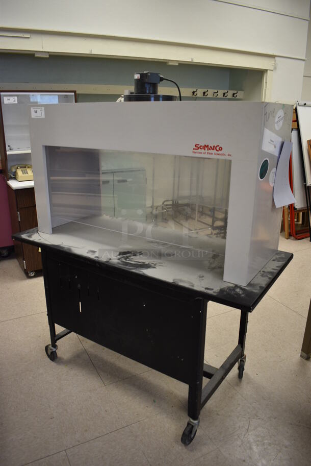 SciMatCo Metal Fume Hood on Black Metal Table on Casters. 115 Volts, 1 Phase. BUYER MUST REMOVE. 54x24x62. (Clearview Elementary - Room 10) - Image 1 of 8