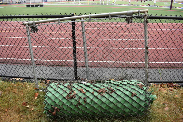 ALL ONE MONEY! Lot of Fence and Rolled Up Fence Grate. BUYER MUST REMOVE. (stadium)