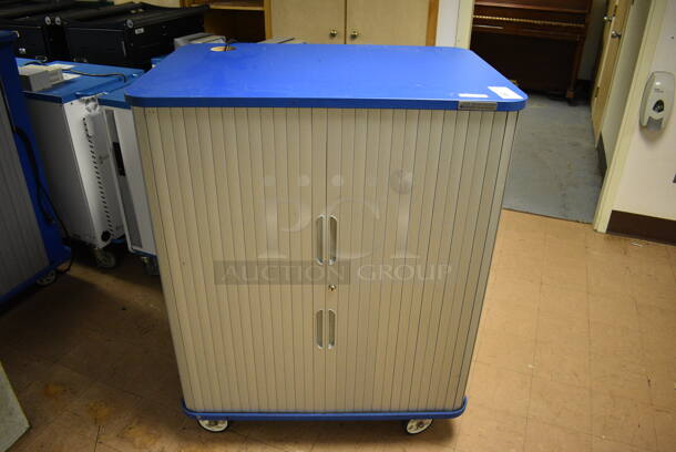 5 JAR Systems Blue and Gray Portable Laptop Storage and Charging Cabinets on Commercial Casters. BUYER MUST REMOVE. 38x26x48. 5 Times Your Bid! (Clearview Elementary - Lower Level)