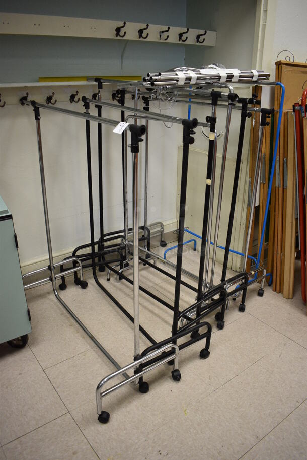 7 Metal Clothes Racks. Includes 39x18x48. 7 Times Your Bid! (Clearview Elementary - Room 10)