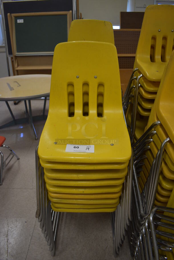 19 Yellow Poly Chairs on Metal Legs. BUYER MUST REMOVE. 16x18x27. 19 Times Your Bid! (Clearview Elementary - Room 10)