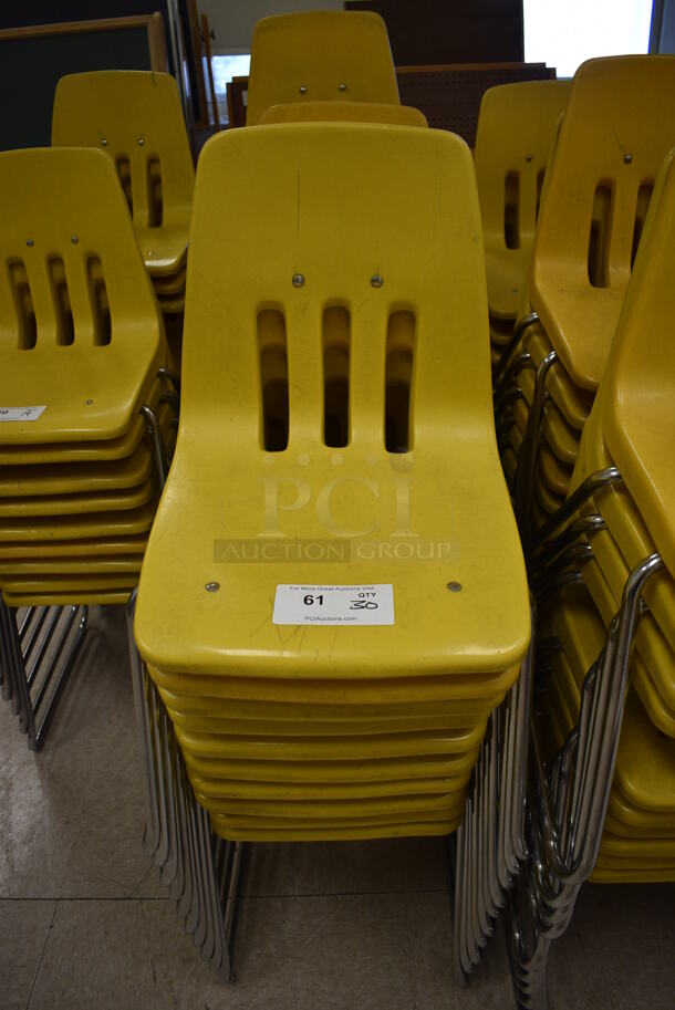 30 Yellow Poly Chairs on Metal Legs. BUYER MUST REMOVE. 16x18x27. 30 Times Your Bid! (Clearview Elementary - Room 10)